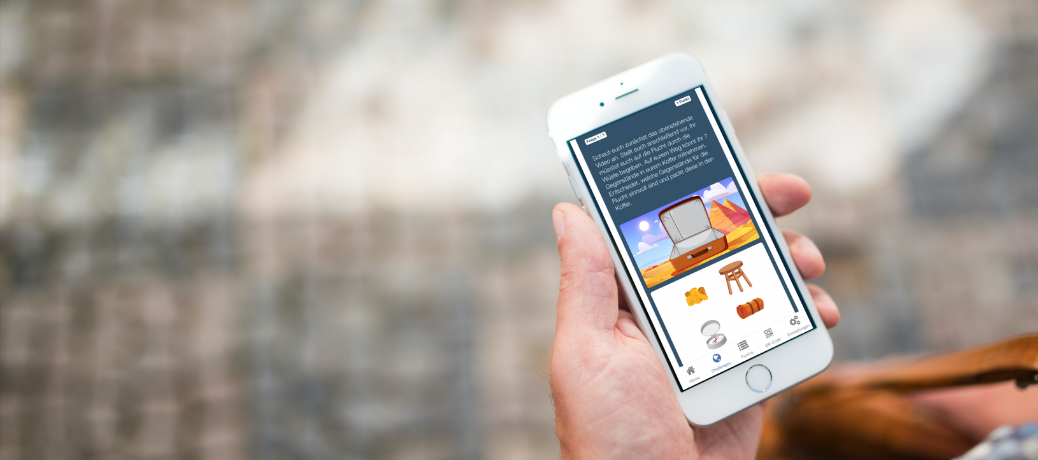 NAVIGATE-Universum App: interaktives Zuordnungs-Mini-Game mit Koffer und Gegenständen – spielerisches Lernen